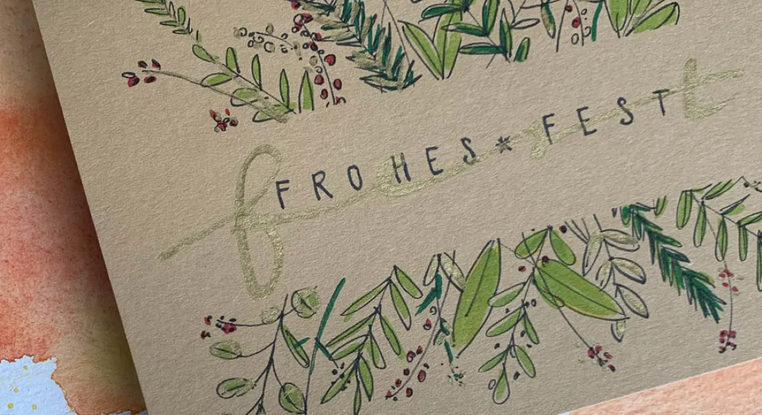 Postkarte mit Handlettering und weihnachtlichen Watercolour Motiv.
